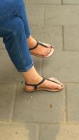 Girls legs in sandals, summer fashion. photo