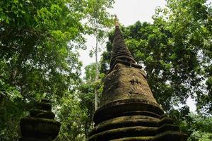 Pagoda built with laterite in Namtok Phlio Chanthaburi Thailand photo