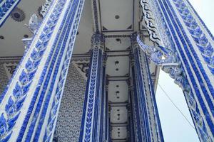 View of the beautiful ceramic blue church, Wat Pak Nam Khaem Nu Temple, Chanthaburi, Thailand. photo