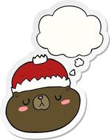 cartoon christmas bear and thought bubble as a printed sticker vector