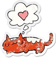 cartoon cat and thought bubble as a distressed worn sticker vector