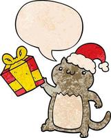 cute cartoon christmas cat and speech bubble in retro texture style vector