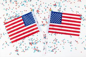 American flags on white background top view photo