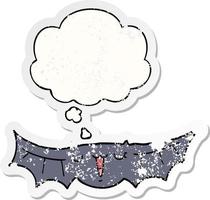 cartoon bat and thought bubble as a distressed worn sticker vector