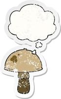 cartoon mushroom and thought bubble as a distressed worn sticker vector