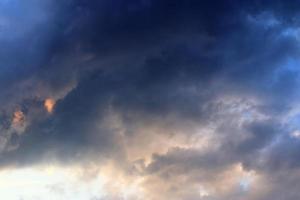 Stunning dark cloud formations right before a thunderstorm photo