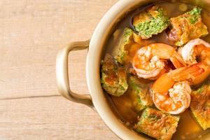 Sour soup made of Tamarind Paste with Shrimps and Vegetable Omelet photo