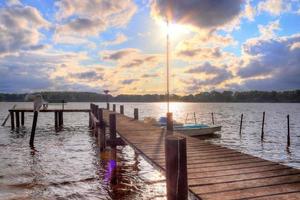 Beautiful landscape at a lake with a reflective water surface photo