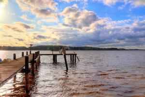 Beautiful landscape at a lake with a reflective water surface photo