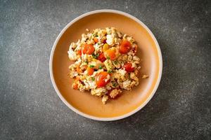 stir-fried tomatoes with egg on plate photo