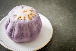 taro bun with white sugar cream and nut photo