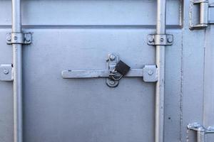 Silver colored industrial Intermodal Shipping Container Door Lock Mechanism for Security During Shipping photo