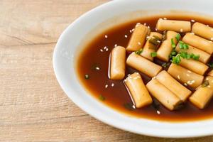 Spicy Jjajang Tteokbokki or Korean rice cake in spicy black bean sauce photo