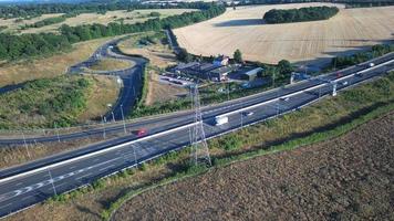 High Angle View of Luton Airport Junction Interchange of Motorways M1 J10 at Luton City of England UK. it is Connection Luton City and London Luton Airport Image Created on 11th August 2022 with Drone photo