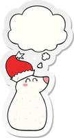 cartoon bear wearing christmas hat and thought bubble as a printed sticker vector