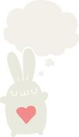 cute cartoon rabbit with love heart and thought bubble in retro style vector