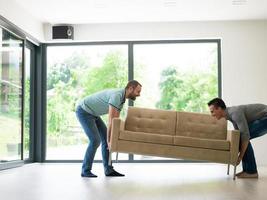 men carry the sofa photo