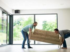 men carry the sofa photo