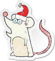 retro distressed sticker of a cartoon mouse in christmas hat vector