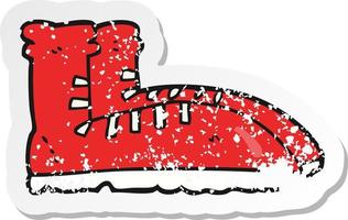 retro distressed sticker of a cartoon boots vector