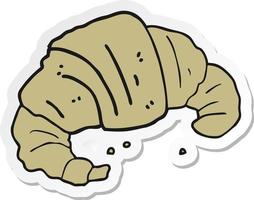 sticker of a cartoon croissant vector