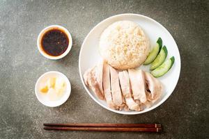 Hainanese chicken rice or rice steamed with chicken soup photo