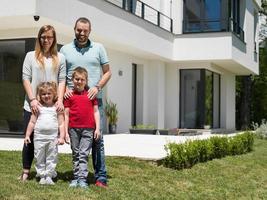 happy family with children in the yard photo