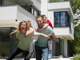 happy family with children in the yard photo