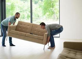 men carry the sofa photo