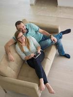 couple relaxes in the living room photo