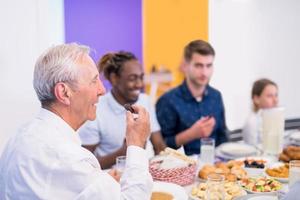 modern muslim grandfather eating dates photo