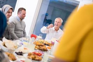 modern multiethnic muslim family having a Ramadan feast photo