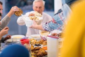 modern multiethnic muslim family having a Ramadan feast photo