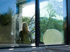 young woman doing morning yoga exercises photo