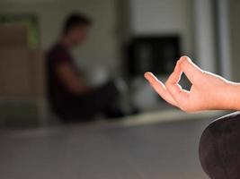 young woman doing morning yoga exercises photo