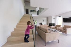 family with little girl enjoys in the modern living room photo