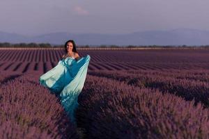 woman in lavender flower field photo