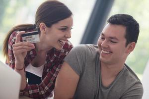 happy young couple buying online photo