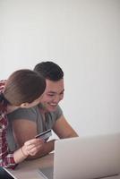 happy young couple buying online photo