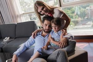 happy young couple spending time with kids photo