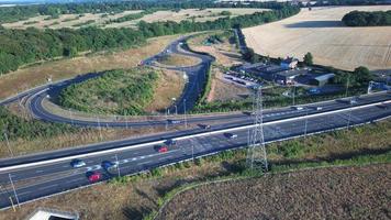 High Angle View of Luton Airport Junction Interchange of Motorways M1 J10 at Luton City of England UK. it is Connection Luton City and London Luton Airport Image Created on 11th August 2022 with Drone photo