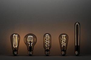 Glowing light fluorescent bulb LED isolated on black concrete background surrounded by incandescent lamp - 3D Rendering photo