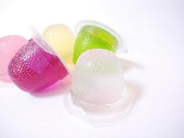 jelly color purple, green, white, pink, yellow. isolated on a white background. close up. photo