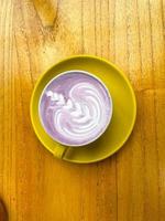 beautiful cup of Taiwanese taro milk drink with latte art photo