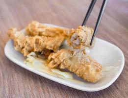 Fried shrimp roll - Taiwanese food cuisine in Tainan, Taiwan restaurant, close up, lifestyle. photo