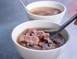 Beef soup - famous food in Taiwan, Asia, Asian Taiwanese street delicacy cuisine, close up, lifestyles, traditional breakfast in Tainan. photo