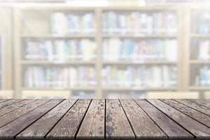 Empty wooden board space platform with library blur background photo