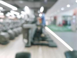 Abstract blur fitness gym equipment background photo