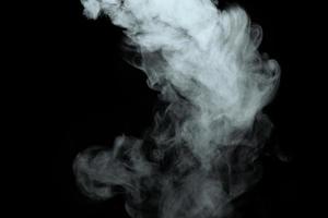 Abstract powder or smoke isolated on black background photo