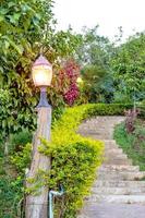 Lamp in garden with stair photo